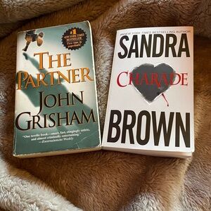 Sandra Brown & John Grisham both paperbacks. Used
